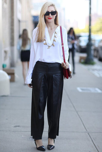 Joanna Hillman's take on white and black is anything but basic with wide leather pants and gold jewels.
Source: Greg Kessler
Joanna Hillman's take on white and black is anything but basic with wide leather pants and gold jewels.
Source: Greg Kessler