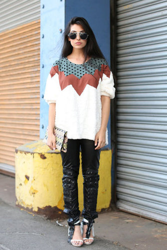 Between the sunglasses, printed topper, and tough-girl leather pants, this outfit takes on so many dimensions of style — and wins.
Between the sunglasses, printed topper, and tough-girl leather pants, this outfit takes on so many dimensions of style — and wins.