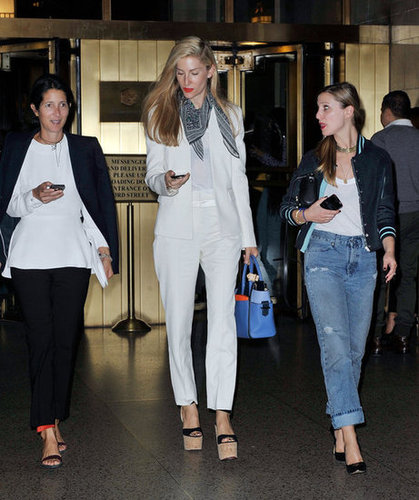 Joanna Hillman made a model-esque appearance in a white suit and a touch of print on her scarf.
Joanna Hillman made a model-esque appearance in a white suit and a touch of print on her scarf.