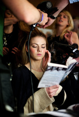 During London's Fashion Week in February, a model read The Man Who Broke Into Auschwitz by Denis Avey while being styled.
During London's Fashion Week in February, a model read The Man Who Broke Into Auschwitz by Denis Avey while being styled.