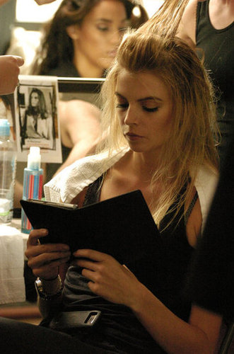 A model focused on her Kindle book while prepping for Trina Turk's show during Mercedes-Benz Fashion Week for Spring 2011.
A model focused on her Kindle book while prepping for Trina Turk's show during Mercedes-Benz Fashion Week for Spring 2011.