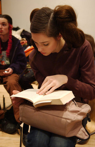 This model raced to finish her book at Benjamin Cho's Fall 2005 show.
This model raced to finish her book at Benjamin Cho's Fall 2005 show.