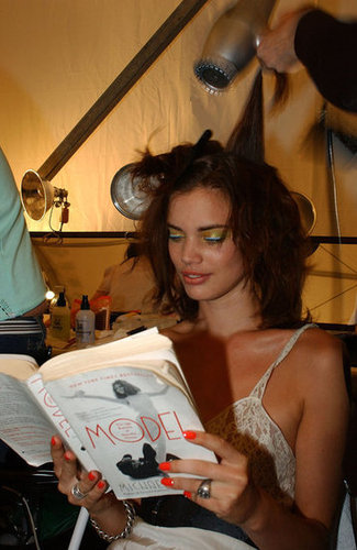 A model read a book about models — Model: The Ugly Business of Beautiful Women by Michael Gross — at Tuleh's Spring 2006 show.
A model read a book about models — Model: The Ugly Business of Beautiful Women by Michael Gross — at Tuleh's Spring 2006 show.