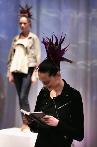 This wild-haired model smiled as she read during London Fashion Week in 2007.
This wild-haired model smiled as she read during London Fashion Week in 2007.