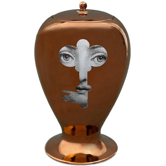 Featuring a gray, keyhole-shaped illustration of a woman's face, the copper-tone Fornasetti Rame Vase ($1,219) is a cool, eclectic accent piece.
Featuring a gray, keyhole-shaped illustration of a woman's face, the copper-tone Fornasetti Rame Vase ($1,219) is a cool, eclectic accent piece.
