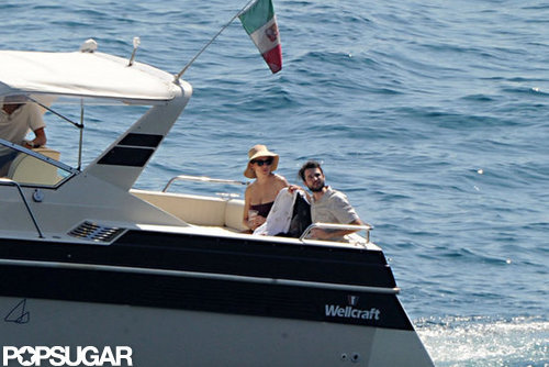 Tom Sturridge and Sienna Miller took a small boat to a larger one in Positano.
Tom Sturridge and Sienna Miller took a small boat to a larger one in Positano.