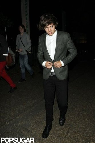 Harry Styles buttoned his jacket after leaving the Future Contemporaries party in London.
Harry Styles buttoned his jacket after leaving the Future Contemporaries party in London.