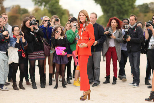 Anna Dello Russo's poppy-red hues drew a crowd outside the shows.
Anna Dello Russo's poppy-red hues drew a crowd outside the shows.