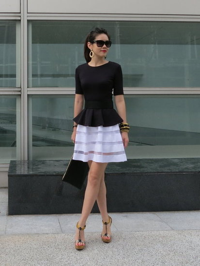 Liven up the black and white outfit with a red lippy and gold accents