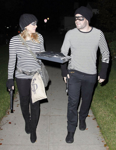 Hilary Duff and Mike Comrie matched as burglars while out in LA in 2011.
Hilary Duff and Mike Comrie matched as burglars while out in LA in 2011.
