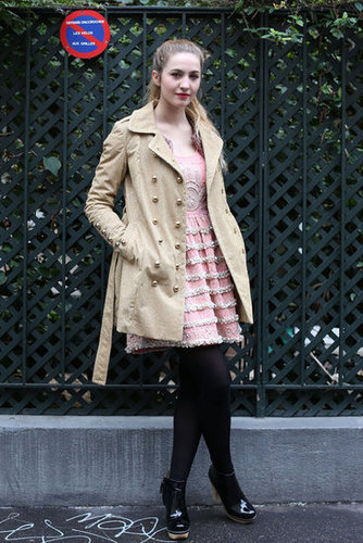 This gilded trench played right into the opulence of her little tiered dress.
This gilded trench played right into the opulence of her little tiered dress.