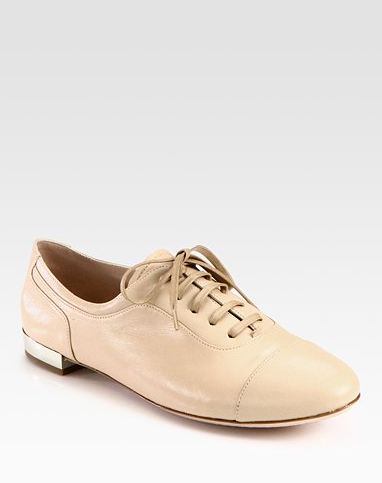 A great neutral with a subtle metallic heel kick, these Miu Miu Lace-Up Leather Oxfords ($595) will go with everything, and we love that they put a girlier spin on the menswear staple.
A great neutral with a subtle metallic heel kick, these Miu Miu Lace-Up Leather Oxfords ($595) will go with everything, and we love that they put a girlier spin on the menswear staple.