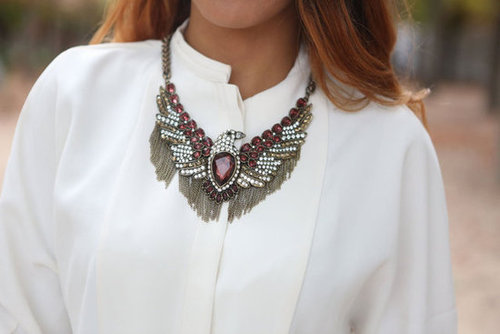 Bold jewels upgraded a basic blouse.
Bold jewels upgraded a basic blouse.