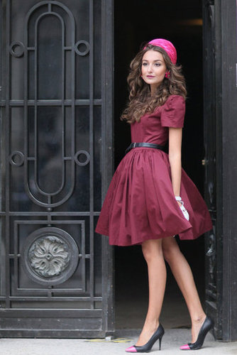 A darling moment from head to toe, thanks to a sweet fit-and-flare and a pop of pink on her pillbox hat.
A darling moment from head to toe, thanks to a sweet fit-and-flare and a pop of pink on her pillbox hat.