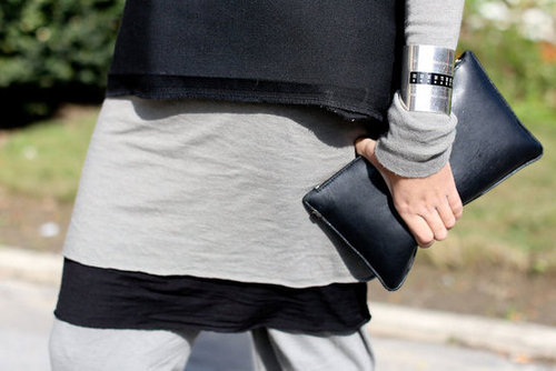 In keeping with the outfit's minimalism, this understated clutch and sleek metal cuff were just the right pieces to finish it off.
In keeping with the outfit's minimalism, this understated clutch and sleek metal cuff were just the right pieces to finish it off.