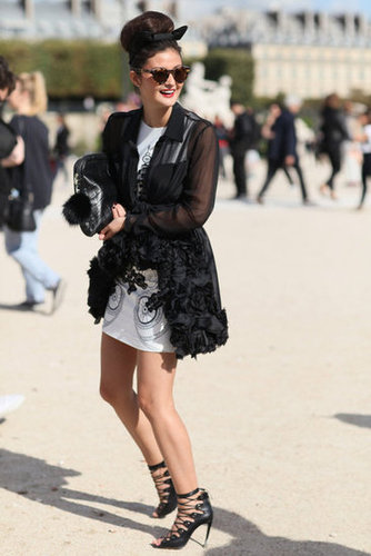 A lot of drama for a little look — this one pulls together floral appliqué, black and white print, and a pair of lace-up stilettos.
A lot of drama for a little look — this one pulls together floral appliqué, black and white print, and a pair of lace-up stilettos.