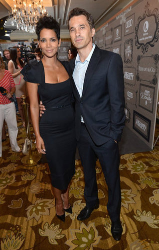 Halle Berry and Olivier Martinez kept their arms around each other inside.
Halle Berry and Olivier Martinez kept their arms around each other inside.