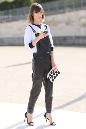 Ankl-strap heels gave these tomboy overalls a feminine finish.
Ankl-strap heels gave these tomboy overalls a feminine finish.