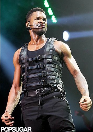 Usher bared his biceps while performing in Belgium in March 2011.
Usher bared his biceps while performing in Belgium in March 2011.