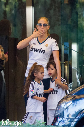 Jennifer Lopez and her twins, Max and Emme, donned matching jerseys to attend a soccer game in Spain.
Jennifer Lopez and her twins, Max and Emme, donned matching jerseys to attend a soccer game in Spain.