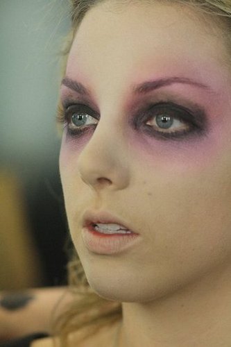 Here's where the eye begins to come together. Apply Pigment in Cornflower Blue just under the lower lash line. Then, apply Pigment in Dark Soul on eyelids and around the lash line. To keep the eyes looking large and bright, line the lower rim of your eyes with a white pencil eyeliner. (Zizzo chose Eye Kohl ($16) in Fascinating.)
Here's where the eye begins to come together. Apply Pigment in Cornflower Blue just under the lower lash line. Then, apply Pigment in Dark Soul on eyelids and around the lash line. To keep the eyes looking large and bright, line the lower rim of your eyes with a white pencil eyeliner. (Zizzo chose Eye Kohl ($16) in Fascinating.)