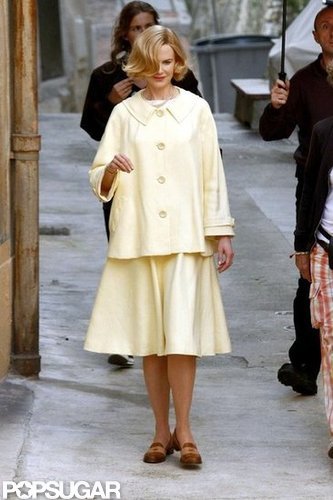 Nicole Kidman was dressed as Grace Kelly in a yellow jacket and skirt for her new film, Grace of Monaco.
Nicole Kidman was dressed as Grace Kelly in a yellow jacket and skirt for her new film, Grace of Monaco.