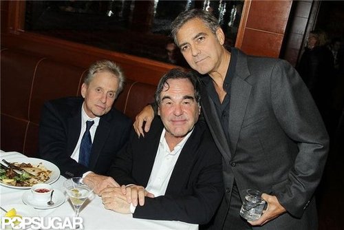George Clooney and Michael Douglas pose for photos at the NYC screening of Argo.
George Clooney and Michael Douglas pose for photos at the NYC screening of Argo.