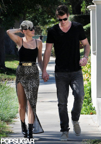 In October 2012, Miley Cyrus and Liam Hemsworth held hands for an LA stroll.
In October 2012, Miley Cyrus and Liam Hemsworth held hands for an LA stroll.