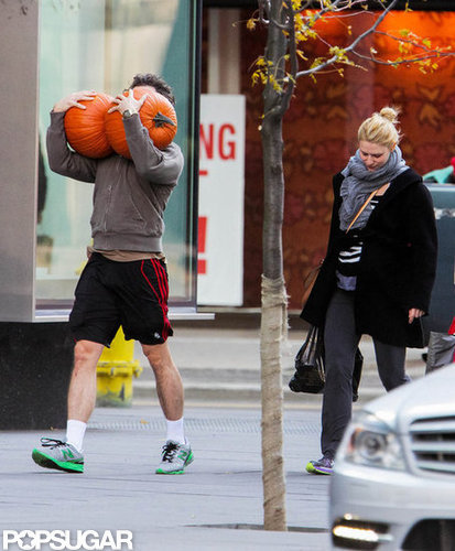 Claire Danes followed behind husband Hugh Dancy who carried two large pumpkins down the street.
Claire Danes followed behind husband Hugh Dancy who carried two large pumpkins down the street.