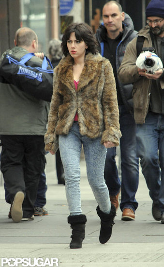 Scarlett Johansson sported a brunette wig and fur coat. Scarlett Johansson sported a brunette wig and fur coat.