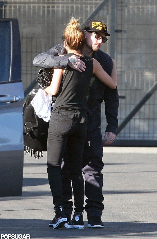Joel Madden hugged Nicole Richie. Joel Madden hugged Nicole Richie.