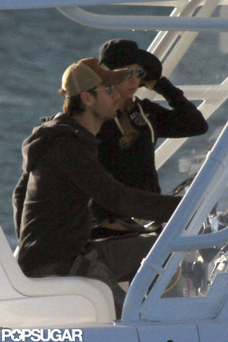 Enrique Iglesias and Anna Kournikova sat side by side on the boat.
Enrique Iglesias and Anna Kournikova sat side by side on the boat.
