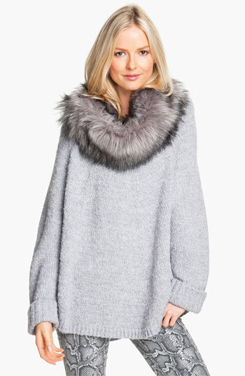 Yes, this Michael Kors faux fur trim poncho sweater ($150) comes with a detachable faux fur loop scarf. How amazing is that?
Yes, this Michael Kors faux fur trim poncho sweater ($150) comes with a detachable faux fur loop scarf. How amazing is that?
