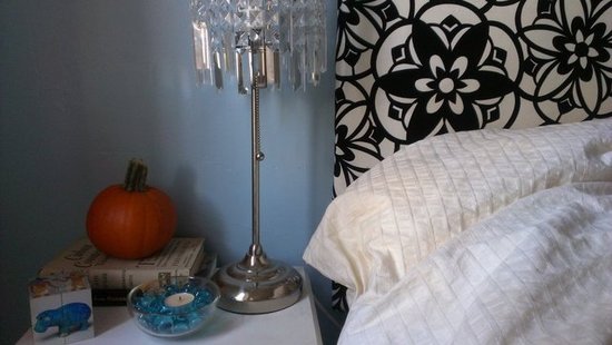 Pumpkin nightstand with velvet tufted headboard