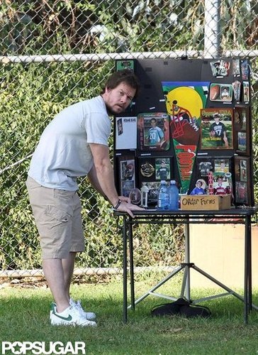 Mark Wahlberg checked out a display table at the park.
Mark Wahlberg checked out a display table at the park.