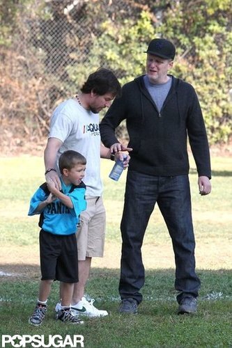 Mark Wahlberg chatted with a fellow game attendee at the park.
Mark Wahlberg chatted with a fellow game attendee at the park.