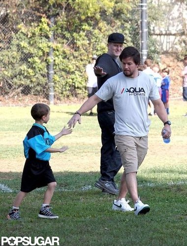 Mark Wahlberg held out his hand for his son Michael.
Mark Wahlberg held out his hand for his son Michael.