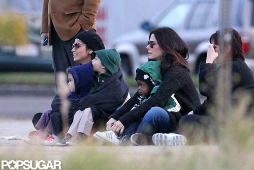 Sandra Bullock had Louis Bullock in her lap as she sat next to Camila Alves and the McConaughey kids in New Orleans.
Sandra Bullock had Louis Bullock in her lap as she sat next to Camila Alves and the McConaughey kids in New Orleans.