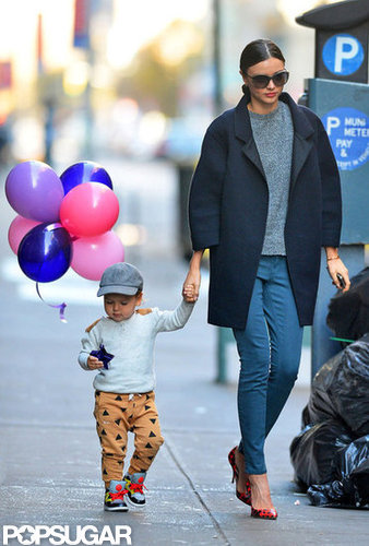 Miranda Kerr wore a black coat and heels for a walk with son Flynn Bloom.
Miranda Kerr wore a black coat and heels for a walk with son Flynn Bloom.