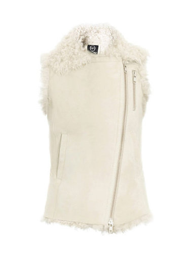 This is one of those aspirational items that you dream about; it's that beautiful and perfect. Or, at least, I dream about. Yes, I'm convinced this McQ by Alexander McQueen shearling gilet ($1,663) is the epitome of Winter white elegance, and I already have some grand plans for how I'd like to layer this zippered vest if I find it under the Christmas tree.
— Marisa Tom, associate editor
This is one of those aspirational items that you dream about; it's that beautiful and perfect. Or, at least, I dream about. Yes, I'm convinced this McQ by Alexander McQueen shearling gilet ($1,663) is the epitome of Winter white elegance, and I already have some grand plans for how I'd like to layer this zippered vest if I find it under the Christmas tree.
— Marisa Tom, associate editor