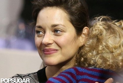 Marion Cotillard held her son, Marcel Canet, close.
Marion Cotillard held her son, Marcel Canet, close.
