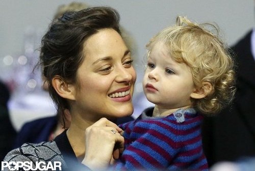 Marion Cotillard smiled at her son, Marcel Canet, while watching the Masters in Paris.
Marion Cotillard smiled at her son, Marcel Canet, while watching the Masters in Paris.