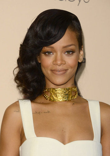Rihanna accessorized her look with a stunning, vintage gold Christian Lacroix collar necklace and a shimmery neutral makeup palette.
Rihanna accessorized her look with a stunning, vintage gold Christian Lacroix collar necklace and a shimmery neutral makeup palette.