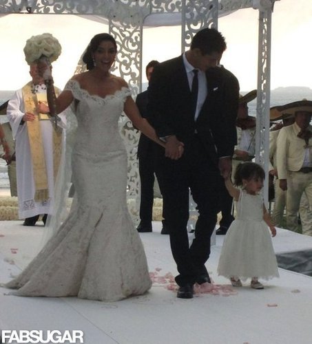 Mario Lopez and Courtney Mazza tied the knot in Punta Mita, Mexico in 2012, and the blushing bride wore a sweeping Chantilly lace gown by Ines Di Santo.
Mario Lopez and Courtney Mazza tied the knot in Punta Mita, Mexico in 2012, and the blushing bride wore a sweeping Chantilly lace gown by Ines Di Santo.