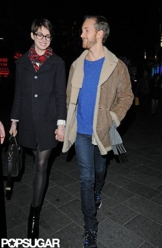 Anne Hathaway held hands with Adam Shulman.
Anne Hathaway held hands with Adam Shulman.