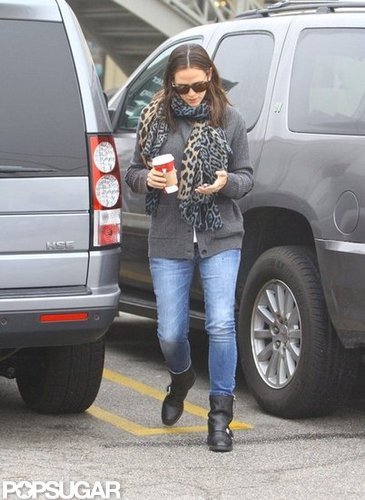 Jennifer Garner walked around her car.
Jennifer Garner walked around her car.