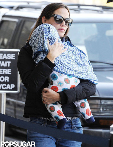 Jennifer Garner headed into LAX with baby Samuel on Sunday.
Jennifer Garner headed into LAX with baby Samuel on Sunday.