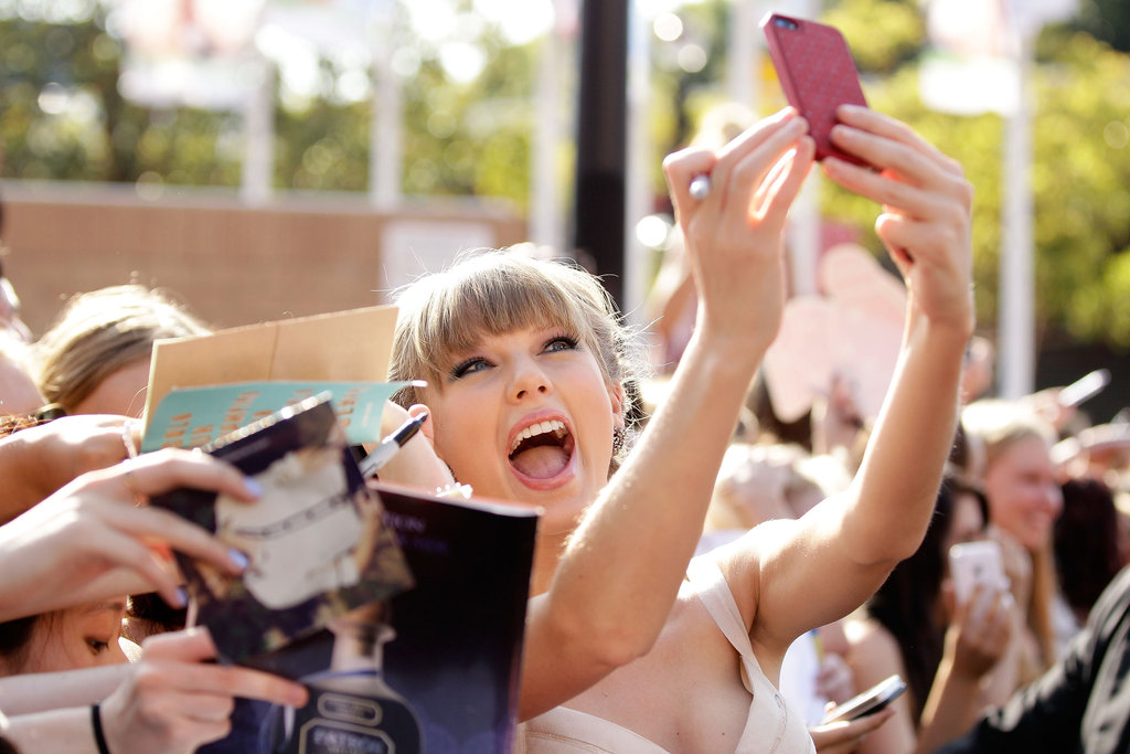 Taylor Swift took photos with her fans while arriving at the ARIA Awards in November 2012.
Taylor Swift took photos with her fans while arriving at the ARIA Awards in November 2012.