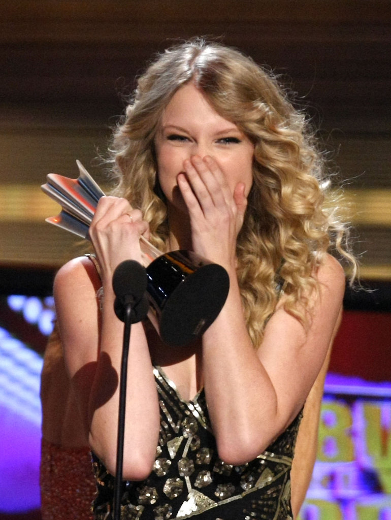 Taylor Swift covered her face while accepting her album of the year award at the Academy of Country Music Awards in April 2009.
Taylor Swift covered her face while accepting her album of the year award at the Academy of Country Music Awards in April 2009.