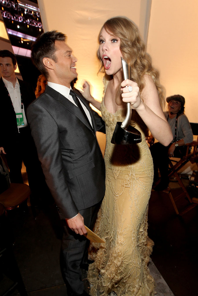 Taylor Swift celebrated her award win with Ryan Seacrest at the ACMs in April 2011.
Taylor Swift celebrated her award win with Ryan Seacrest at the ACMs in April 2011.